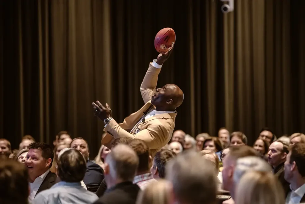 Terrell Davis snags a pass at the 2024 Strength in the Face of Adversity Luncheon 